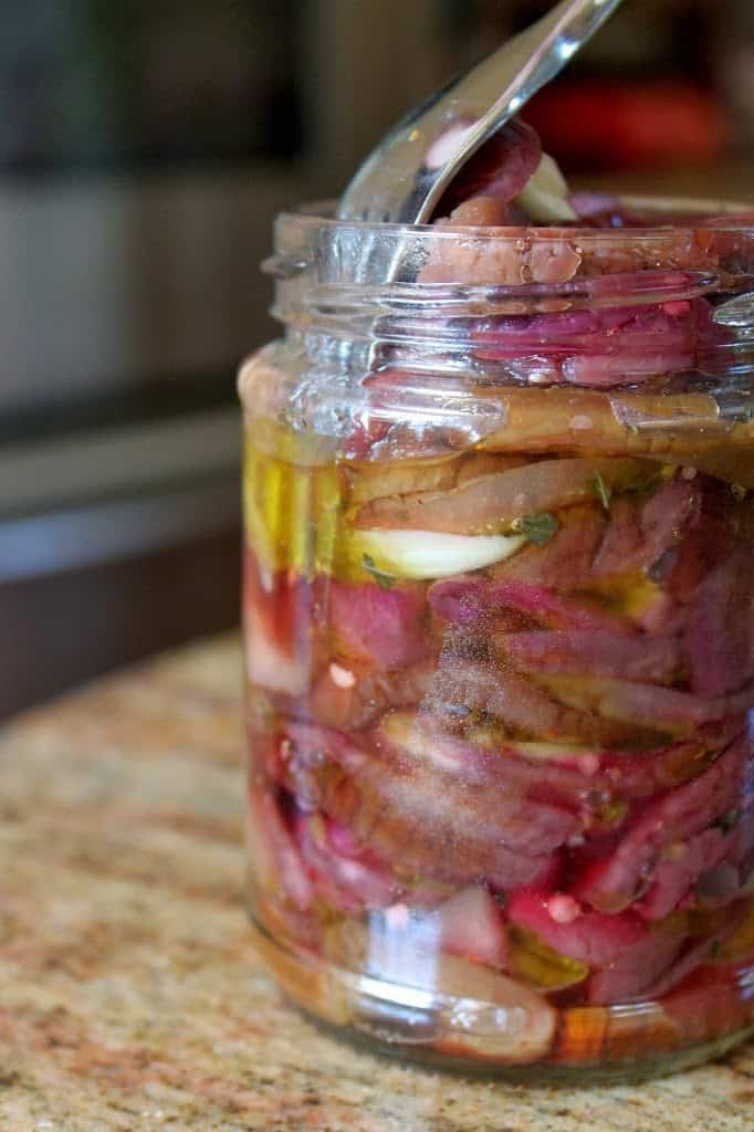 jar of pickled eggplant/aubergines. 
