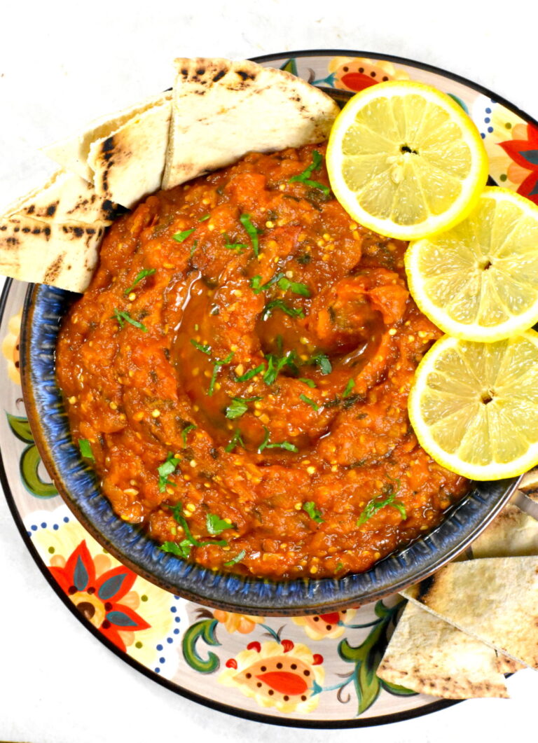 Bowl of zaalouk atop the Gypsy Plate.