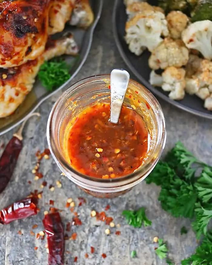 Photo of jar with Pumpkin Chili Sauce.